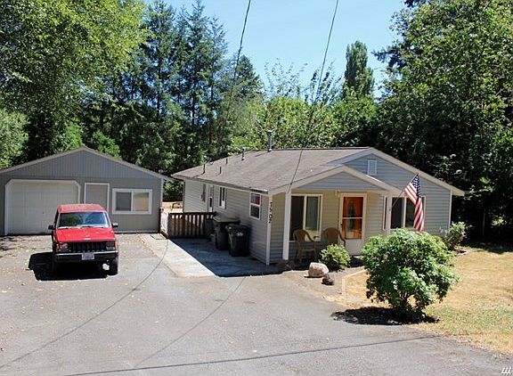 Detached garage that is extra long plus office space.
