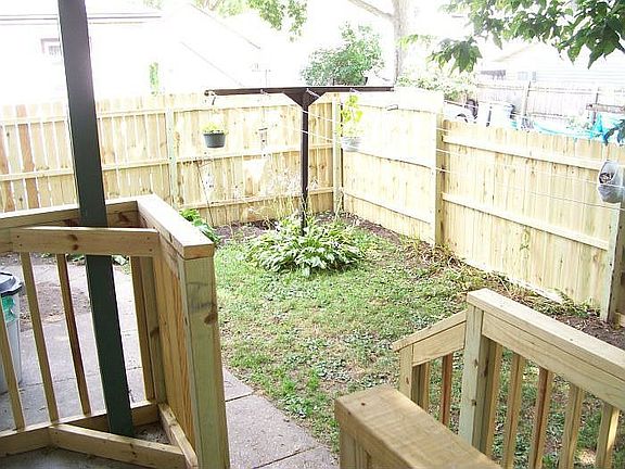 Back yard new fence new railings