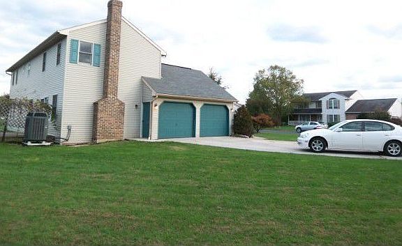Side entry garage with man door