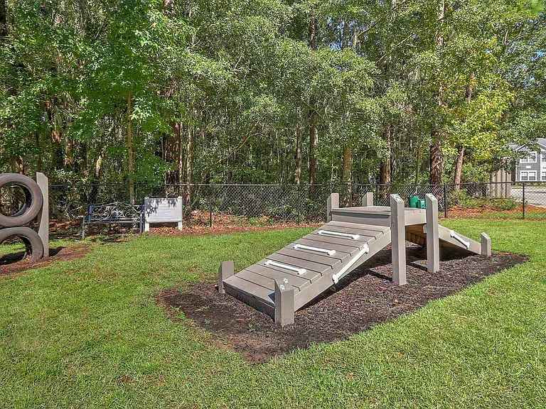 Unleash the excitement in our off-leash dog park with agility equipment, perfect for your four-legged adventurer.