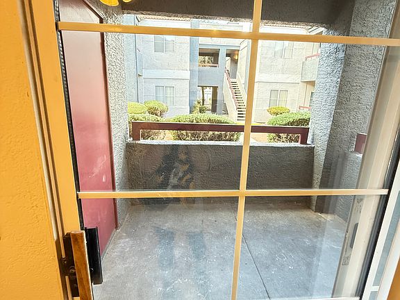 Sliding glass doors lead to the patio, creating a seamless indoor-outdoor living experience.