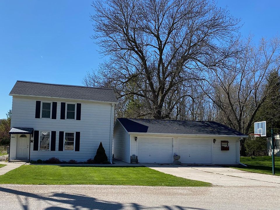2 story home, detached garage, "country setting"