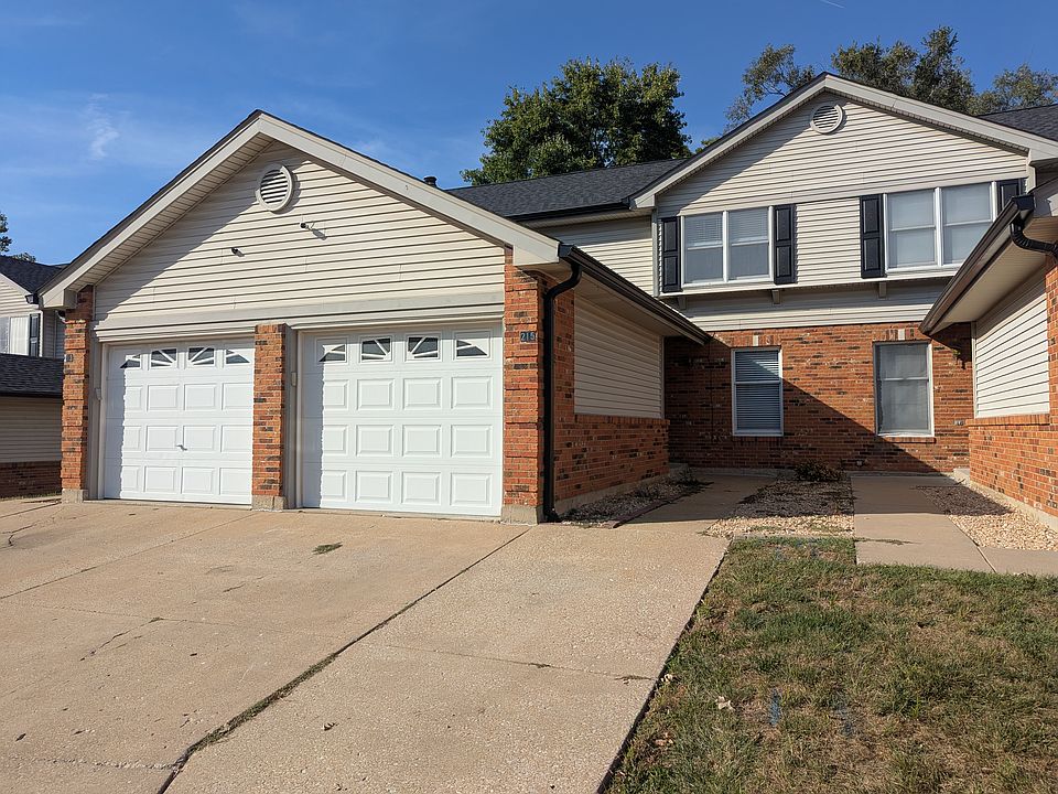 Condo Front
Driveway is wide enough for 2 vehicles park side by side. Garage door includes keypad entry and car remote.