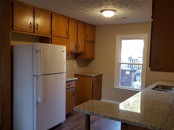 Kitchen with breakfast nook, and dining room.