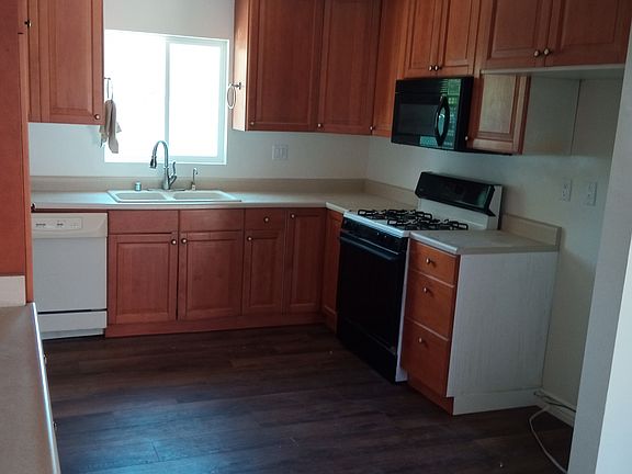 4th image of 8833 S Nogal Ave