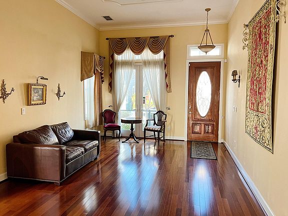Gorgeous formal living room with plenty of natural light.