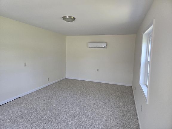 Primary bedroom exiting to a private patio. Separate AC mini-split for the bedroom.