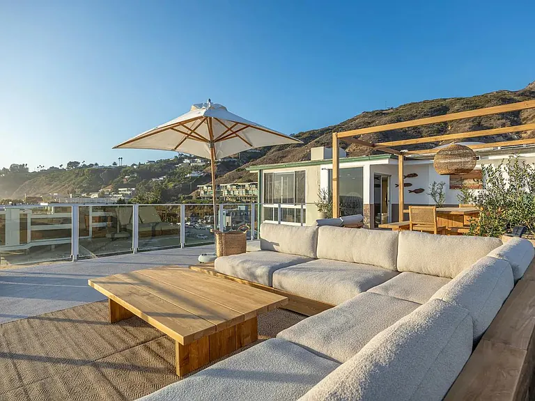Indulge in open-air luxury on the deck, where every moment is framed by Pacific horizons.