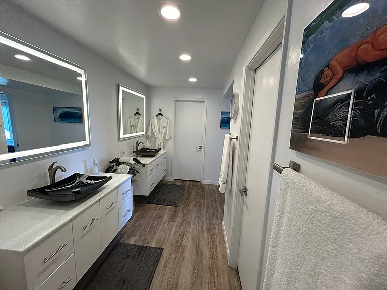master bath with multiple closets