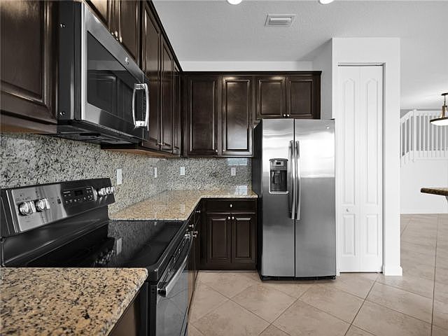 1st image of 9571 Town Parc Cir N