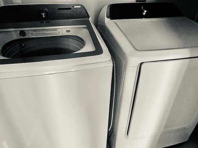 Full size, washer/dryer in laundry closet.
