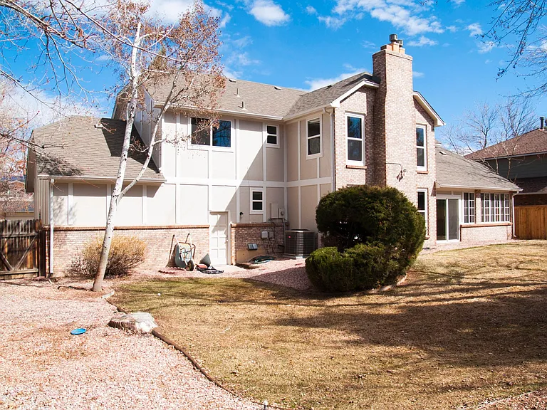 Exterior - back yard with large shade trees