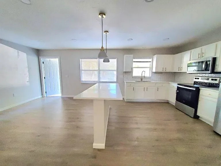 4390 Sibley Bay St #J-D — Photo 20