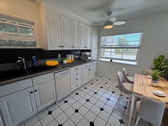 Kitchen with room for table/chairs 
 in front of the window