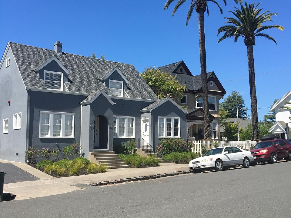 Street view. The subject property is a stand alone building in the rear of the property.