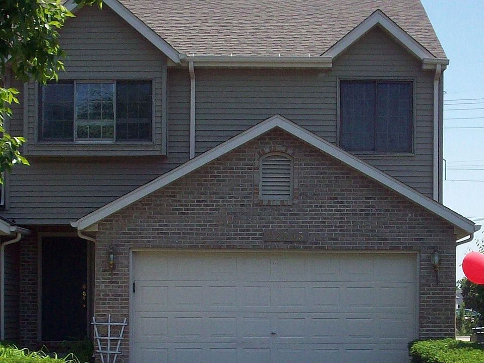 Brick and Vinyl Exterior