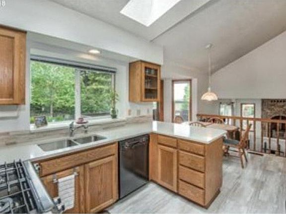 Open Living From Kitchen to Sunken Living Room