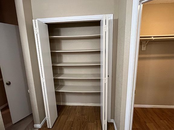 2 of 3 Master bath closets