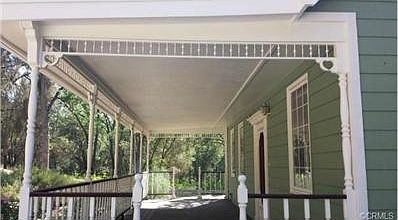 Covered front porch invites you in~
