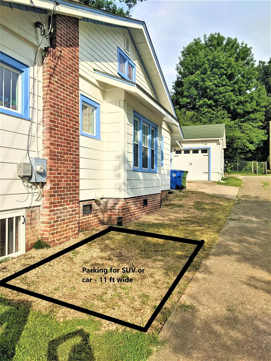 Parking for two cars on the side of the house - Toyota Tacoma is largest size that can fit easily - 25 Brevard Rd