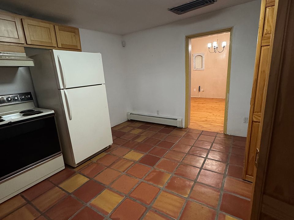 Saltillo tile, mexican tile counter tops, custom solid wood cabinets