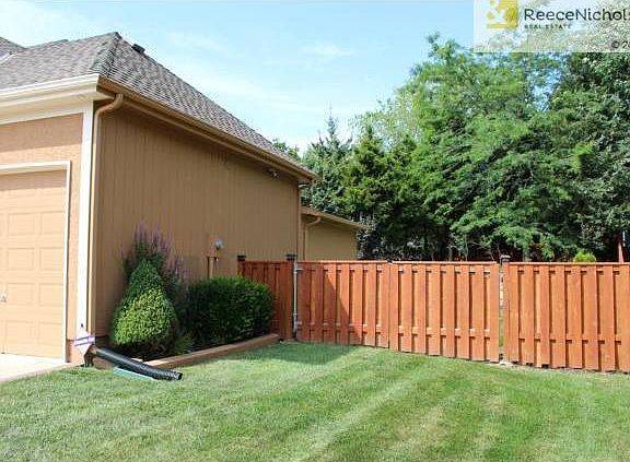 Side yard, custom made fence.
