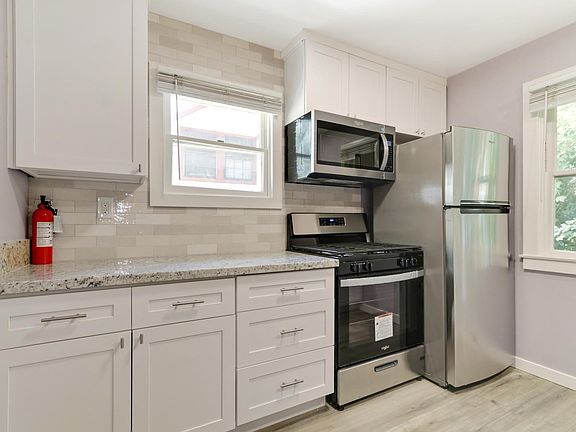 Brand new kitchen including new appliances, counters, cabinets and fixtures.