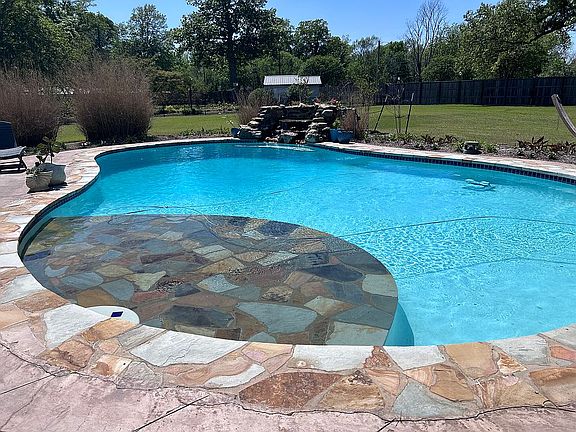 Gunite pool with waterfall