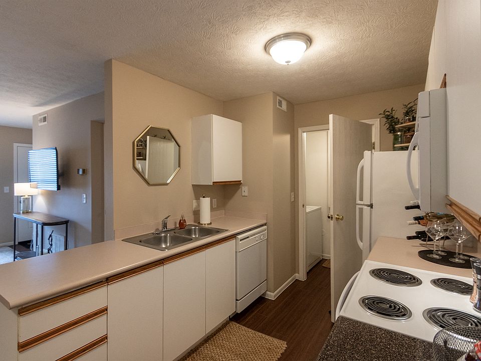 Our model Liberty kitchen features both upgraded cabinetry with dark countertops and classic cabinetry with light countertops.