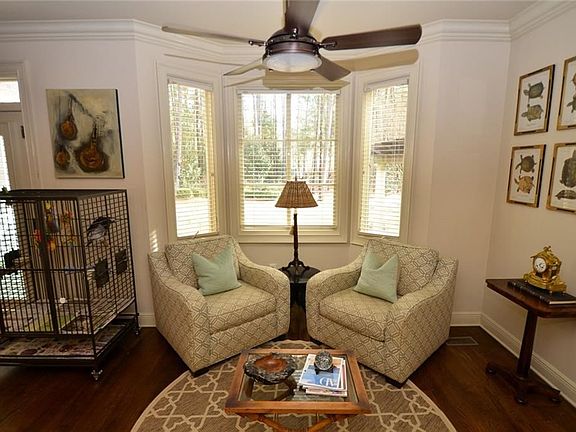 Breakfast Room/Sitting Area overlooking the back yard--connects to the Kitchen and Living Room.