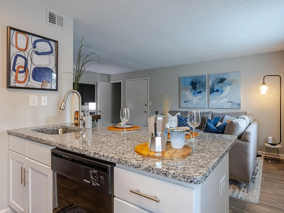 Kitchen with granite counters & deep stainless sink