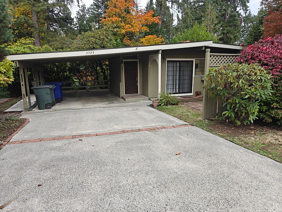 large driveway and carport