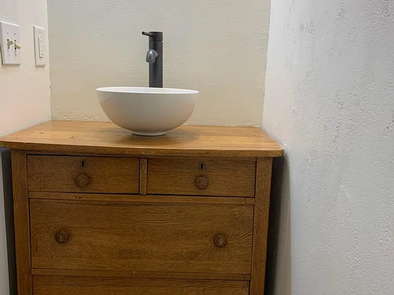 Unique sink & vanity in 1st floor powder room