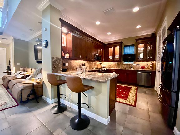 Kitchen and living room seating.