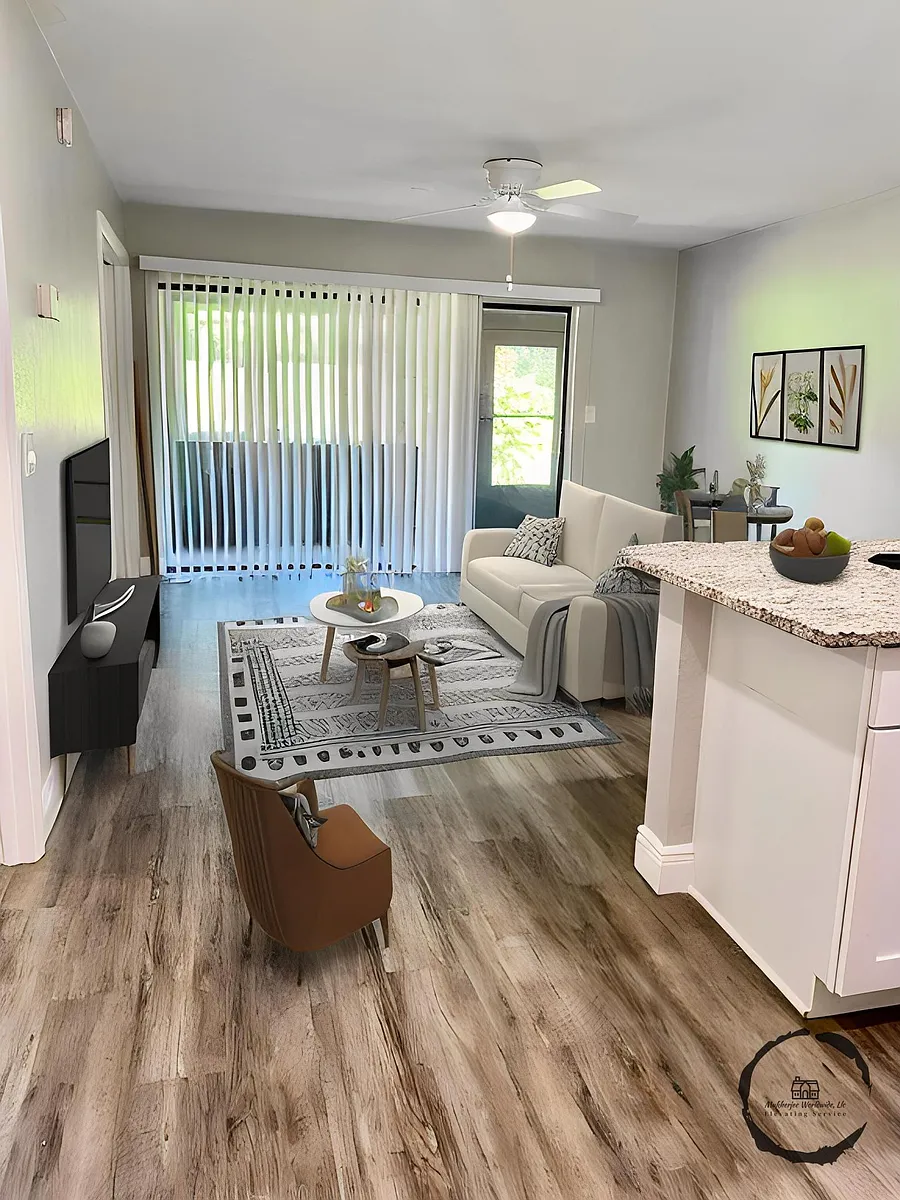 Open concept living room & kitchen, with enclosed patio. - 232 Orienta Point St #232