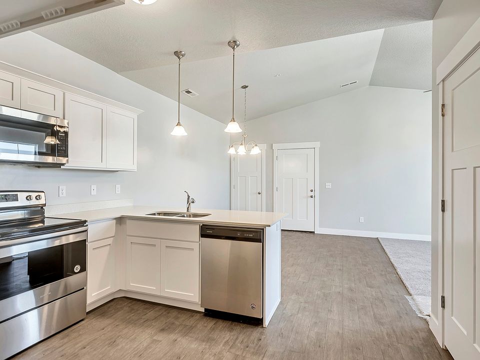 Kitchen over looking Dining Room and Living Room