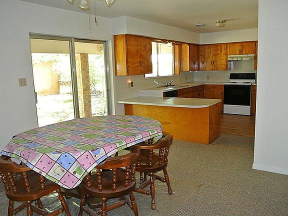 LOOKING TOWARDS KITCHEN FROM DINING ROOM