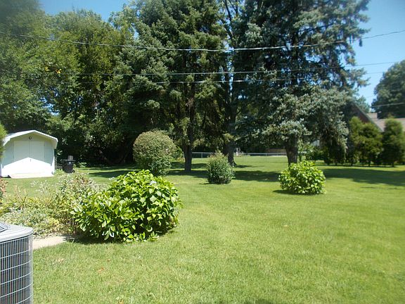 Huge fenced back yard & shed