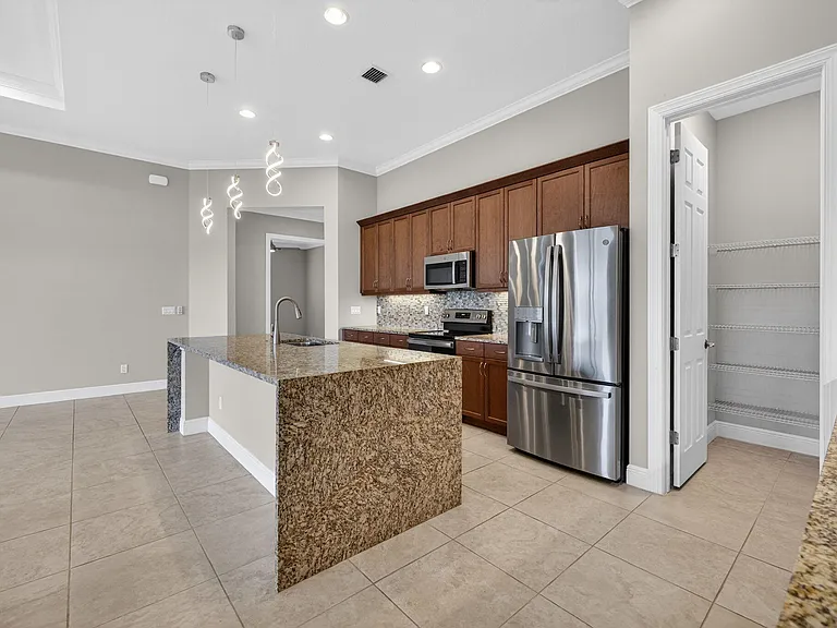 9318 SW Miracoli Way — Photo 22