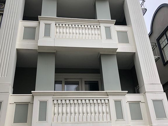 Front of building - unit is on top 2 levels