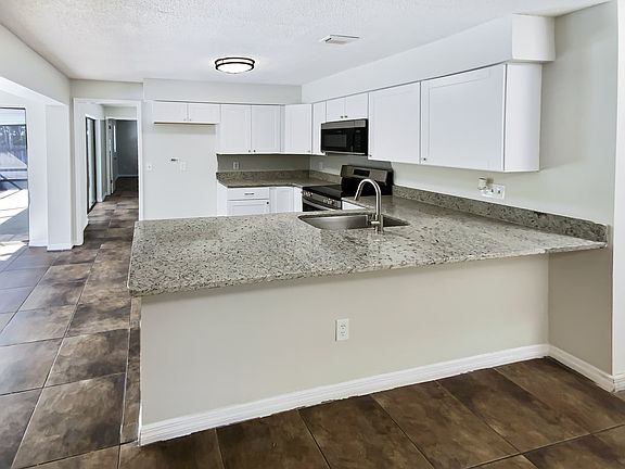 2nd image of 4000 Quenita Dr #Dr26-26