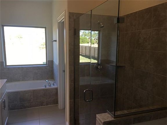 Photo of similar home further along in construction process. Actual home under construction.