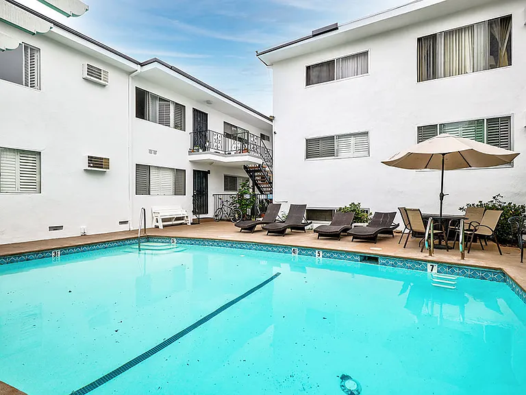 Large outdoor pool with lounging space.
