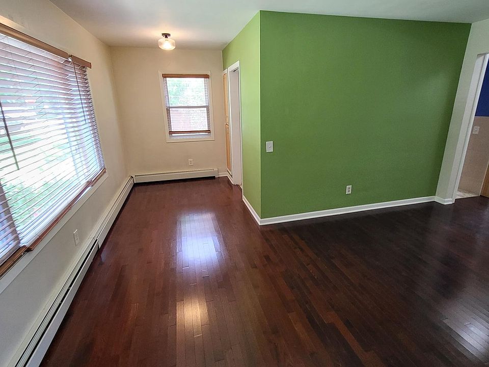 Looking in main door to dining nook and living room