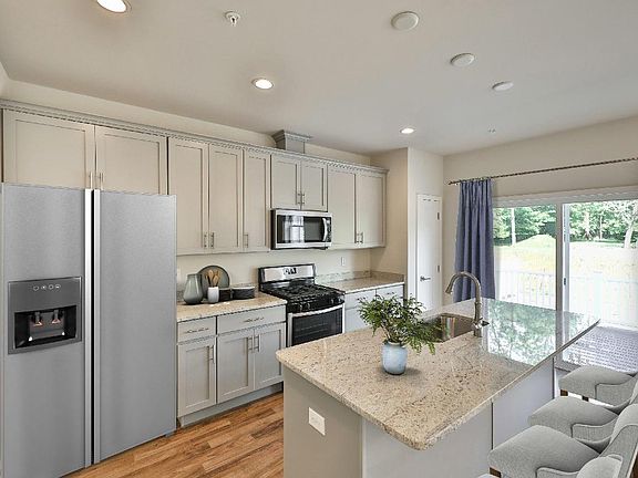 The Kitchen Overlooks the Great Room