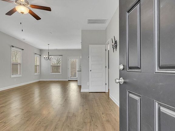 Front door leads to open concept downstairs