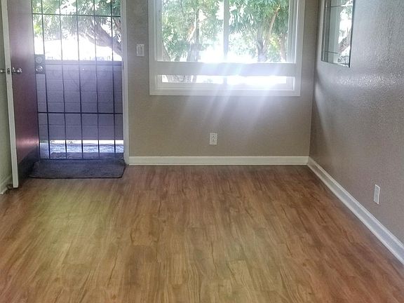 Looking towards the front screen door and window