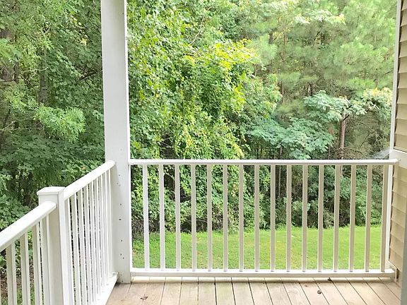 Spacious deck with a private wooded view