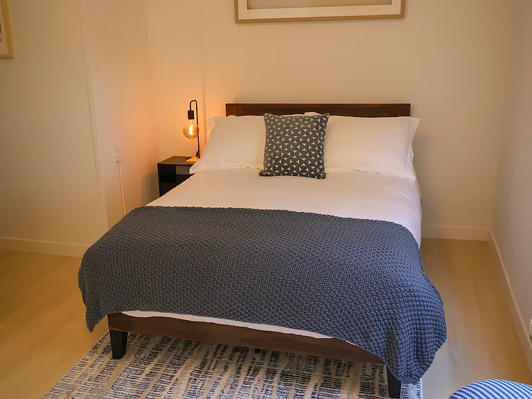 Spacious master bedroom with full-size bed with luxury, memory foam mattress. Study nook in master bedroom.