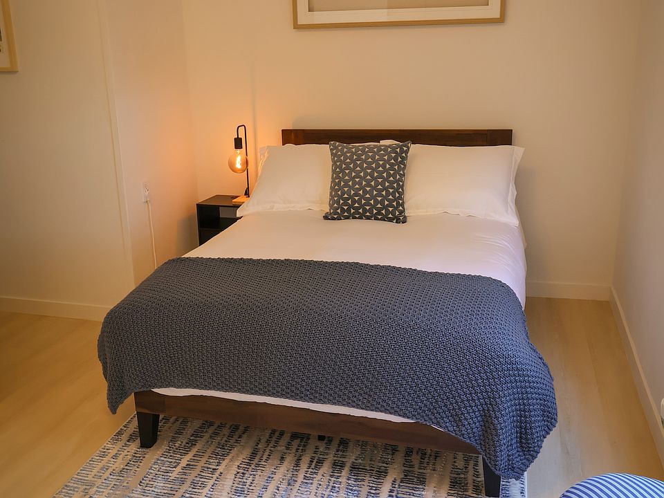 Spacious master bedroom with full-size bed with luxury, memory foam mattress. Study nook in master bedroom.